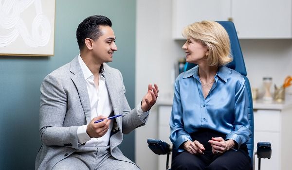 Dr. Kachare discussing treatment with patient.