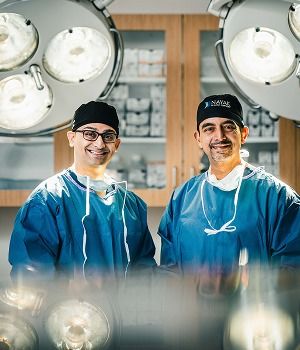 St. Louis facial plastic surgeon Dr. Nayak and Dr. Kachare posing together.