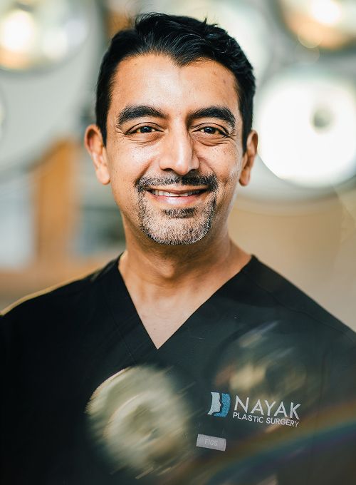 Two men in formal attire, posed together.