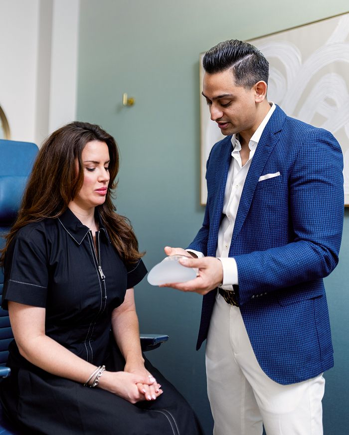 Dr. Kachare discussing treatment with patient.