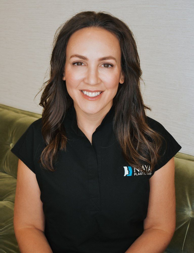 Smiling woman in a professional setting.