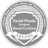 Board-certified facial plastic surgeon emblem.