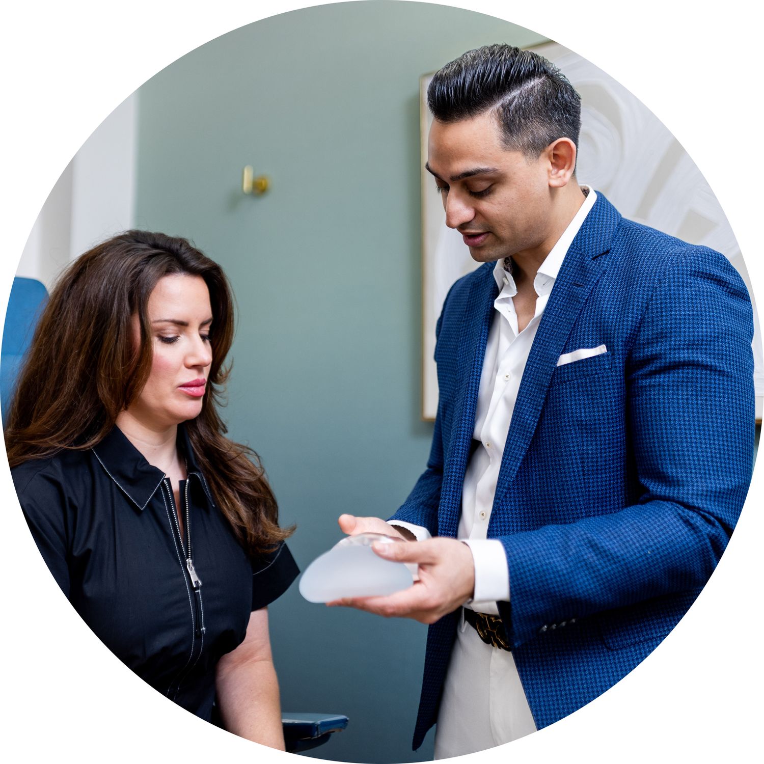 Consultation about breast implants with a patient.