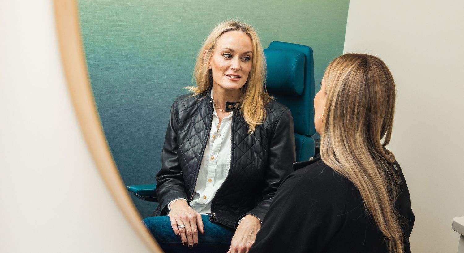 Women discussing in a modern consultation room.